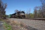 NS 1083 and 3630 take an intermodal train down the siding at Cove PA